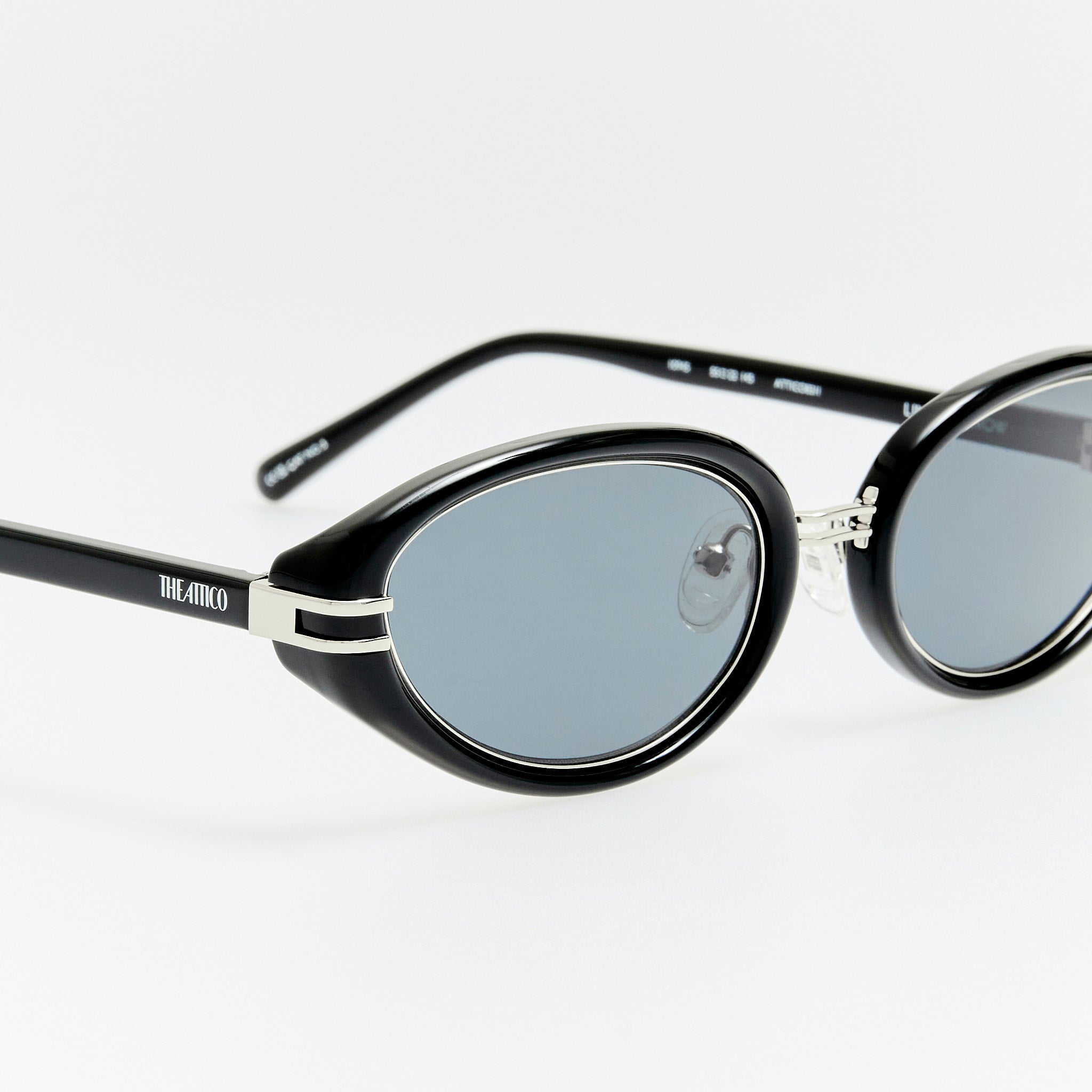 Ambra Oval Sunglasses in Black and Grey