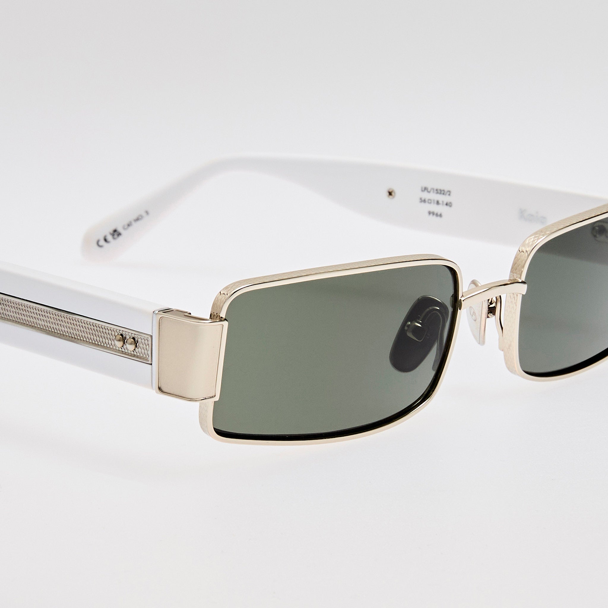 Kaia Sunglasses in Grey and White Gold