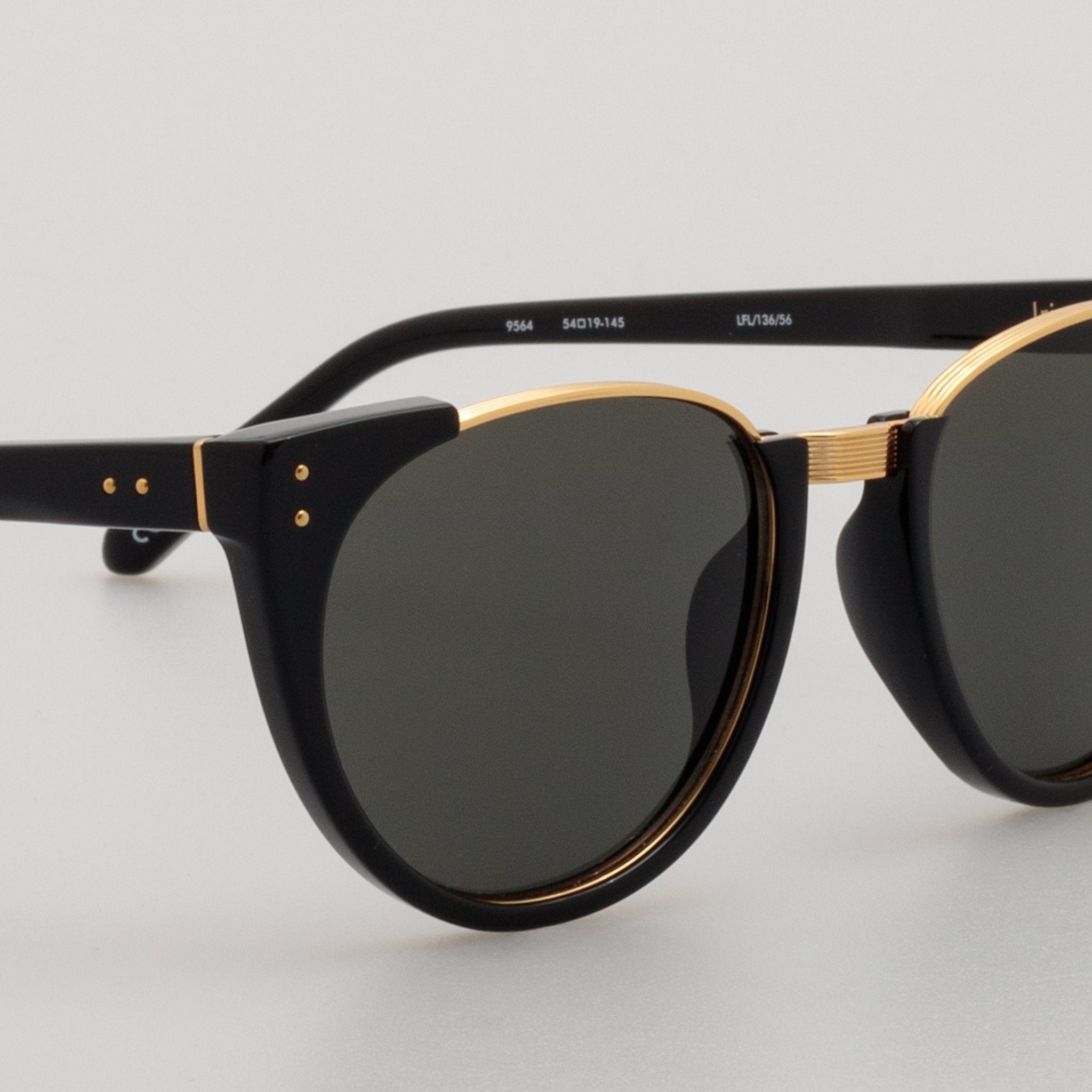Iris Oval Sunglasses in Black - LINDA FARROW - Sunglasses -