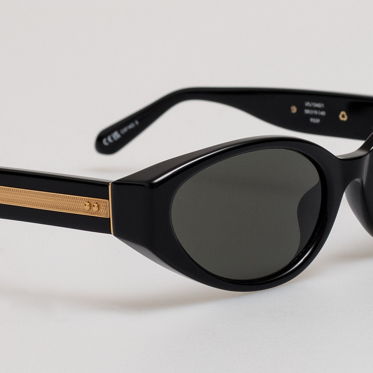 Lyra Oval Sunglasses in Black - LINDA FARROW - Sunglasses -