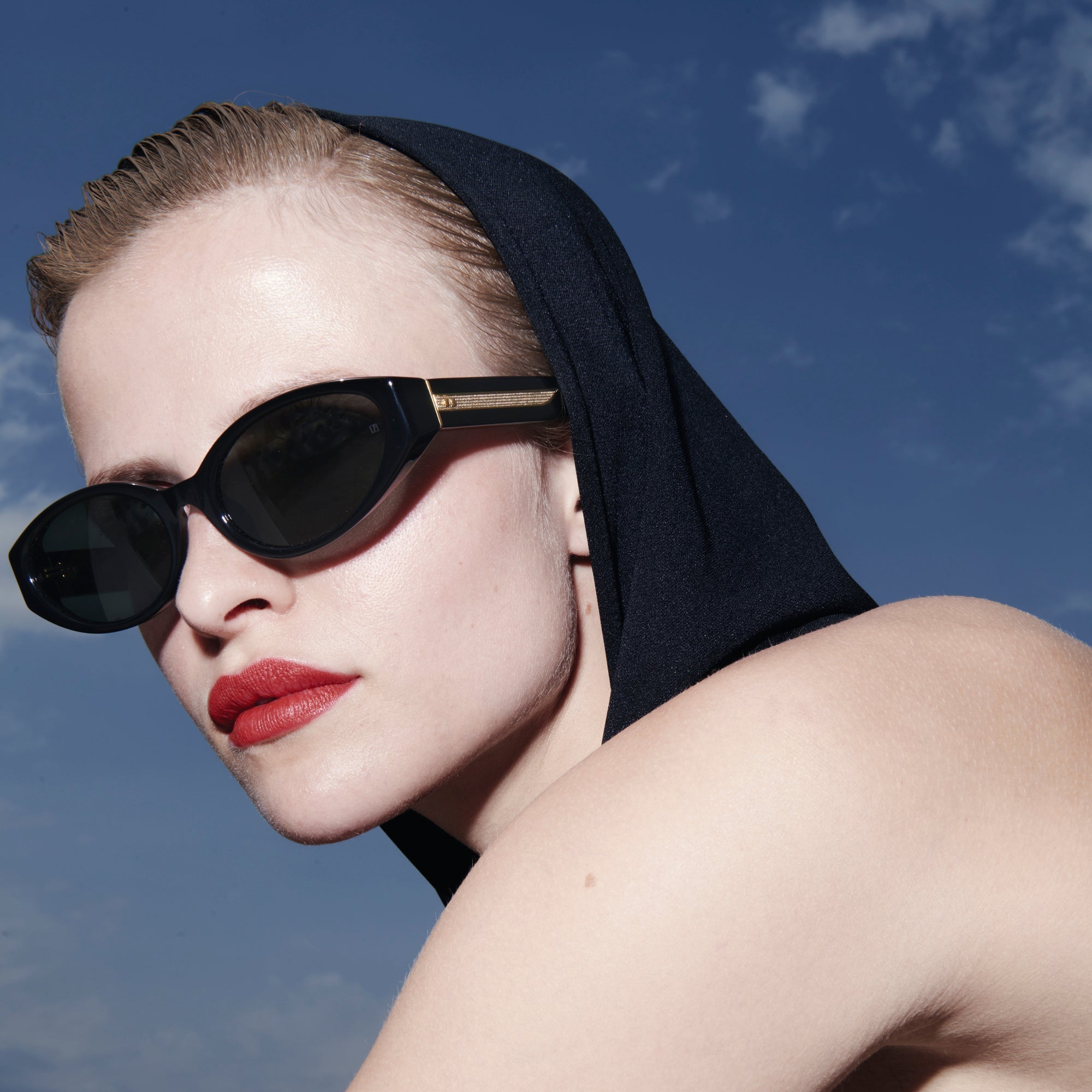 Lyra Oval Sunglasses in Black - LINDA FARROW - Sunglasses -