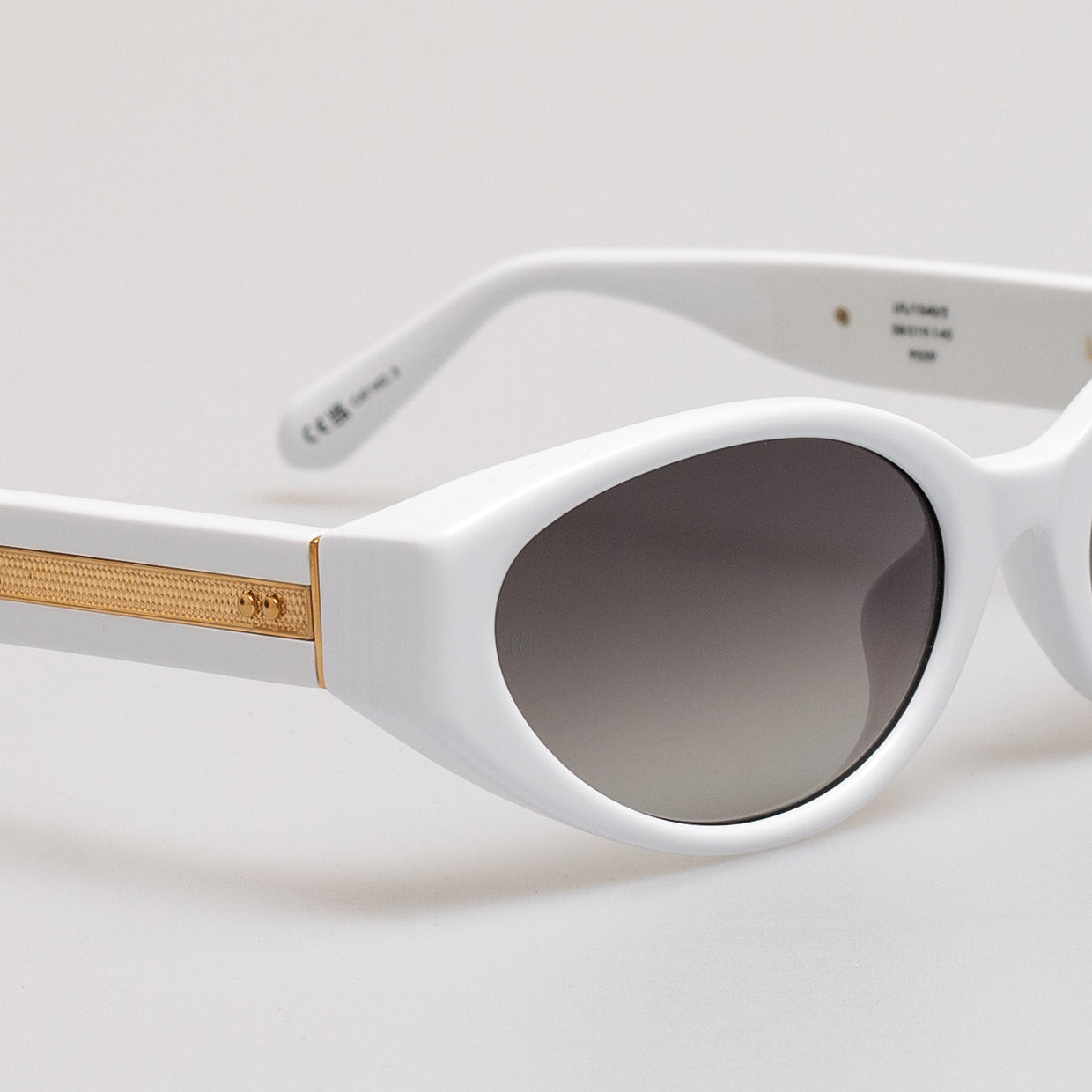 Lyra Oval Sunglasses in White - LINDA FARROW - Sunglasses -