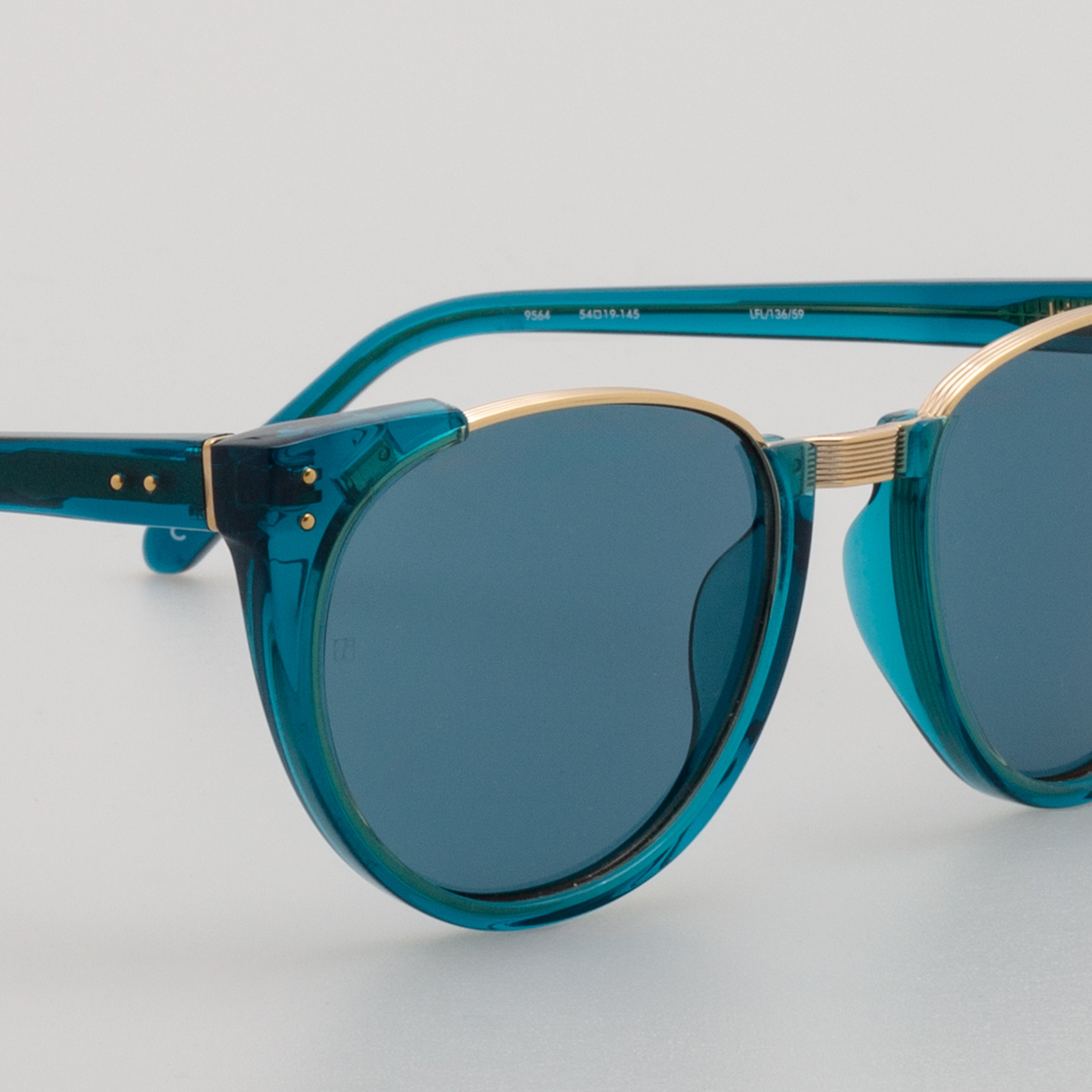 Iris Oval Sunglasses in Aqua